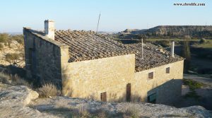 Se vende Finca rústica cerca de Caspe con almacén