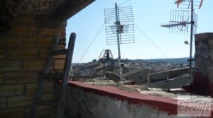 Foto de Casa de piedra en el centro de Batea con calefacción central