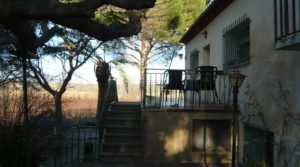 Gran casa de campo en Maella en venta con río por 275.000€