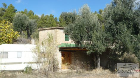 Casa en el río Tastavins, en La Portellada.