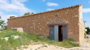 Casa de piedra en Caspe a buen precio con olivos