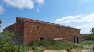 Casa de piedra en Caspe a buen precio con frutales