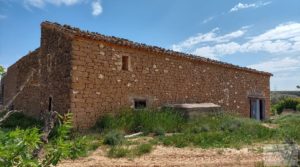 Casa de piedra en Caspe a buen precio con frutales por 28.000€