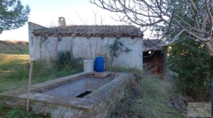 Foto de Casa de Campo en Caspe con olivos centenarios, almendros e higueras. en venta con chimenea por 35.000€