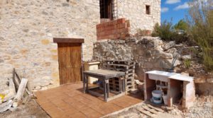 Finca con olivos centenarios y casa de piedra en Nonaspe. en oferta con hermosas vistas