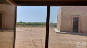 Finca de 7000 m2. en Alcañiz con taller de escultura. en venta por 575.000€